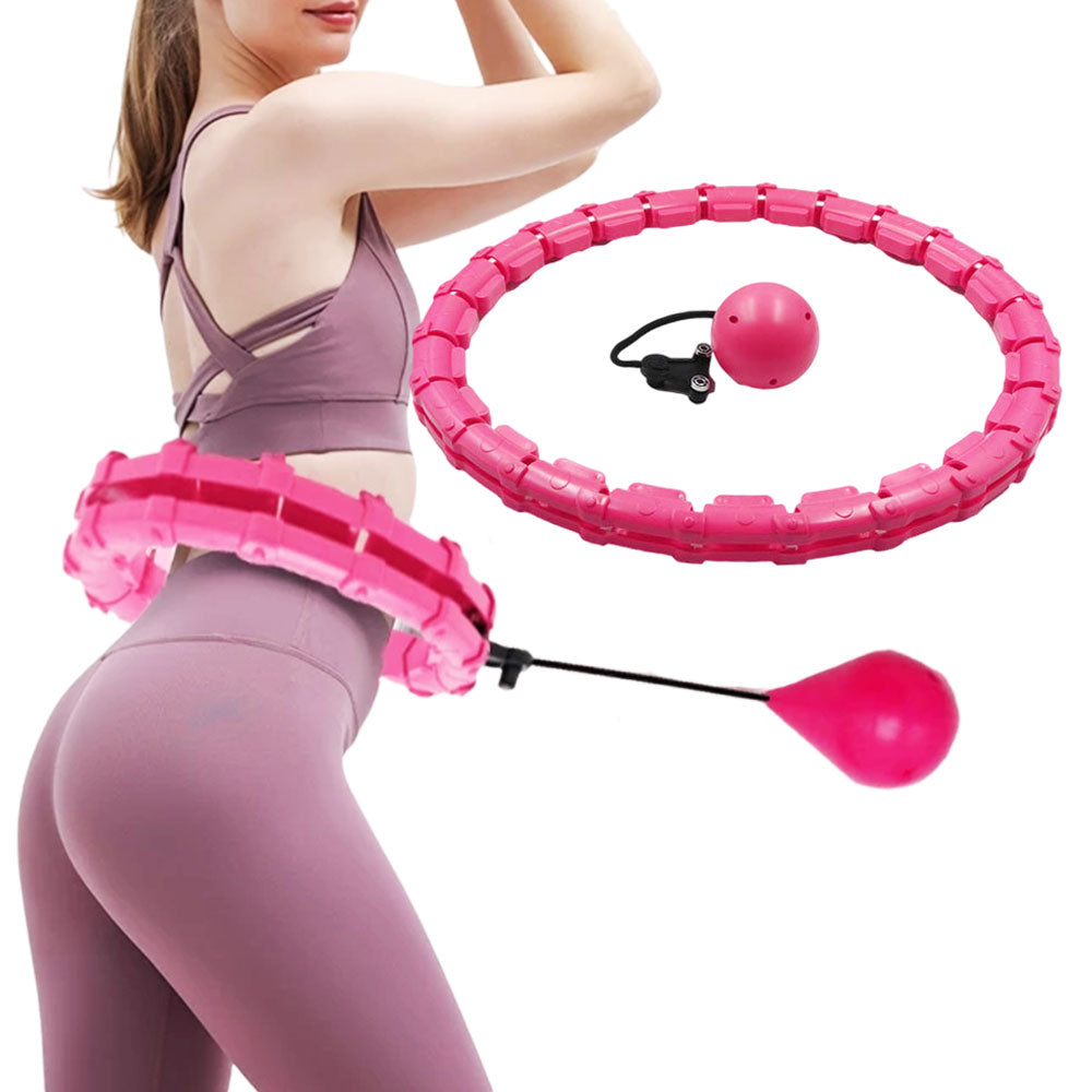 Fitlybuy pink smart hula hoop with adjustable weight and LED light, worn by a woman in a matching gym set.