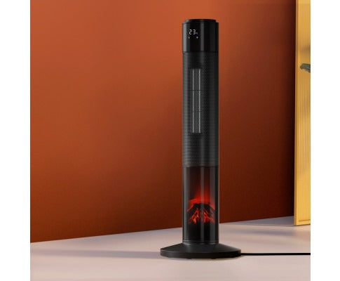 Black Fitlybuy ceramic tower heater with digital display and 3D flame effect base, standing on a floor against a wall.