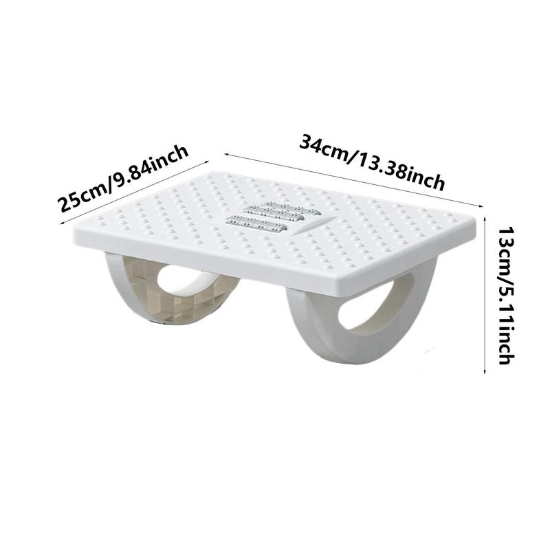 White Fitlybuy ergonomic rocker footrest with textured surface and dimensions labeled: 34cm x 25cm x 13cm.