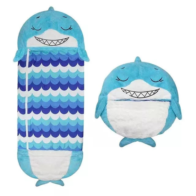 Fitlybuy blue shark kids sleeping bag shown unrolled and folded into a plush pillow shape with a soft, wave pattern.