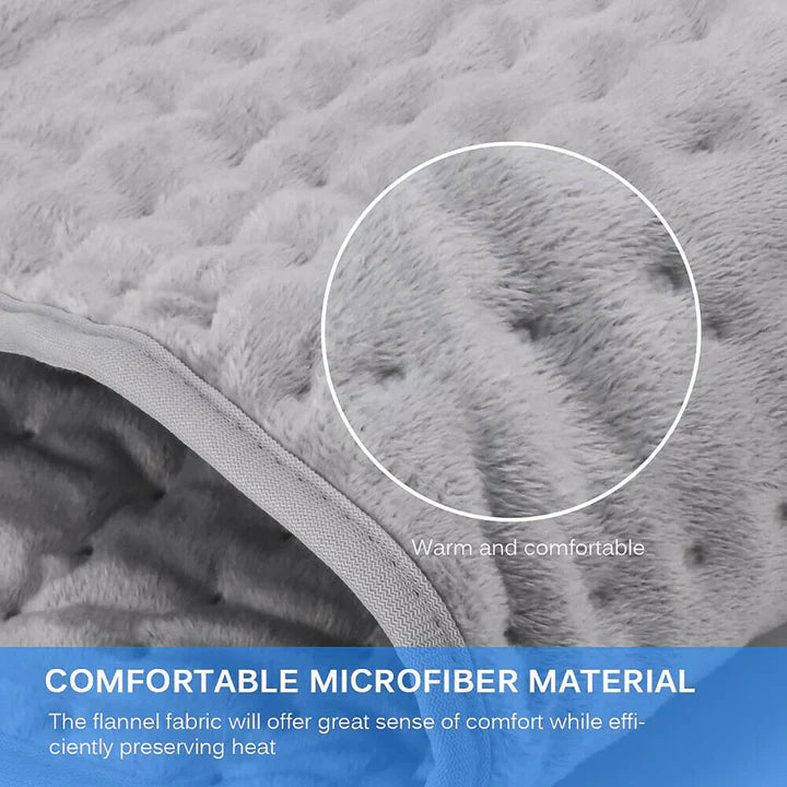 Soft, grey flannel heated therapy pad with a textured finish for back and muscle relief, featuring microfiber fabric.