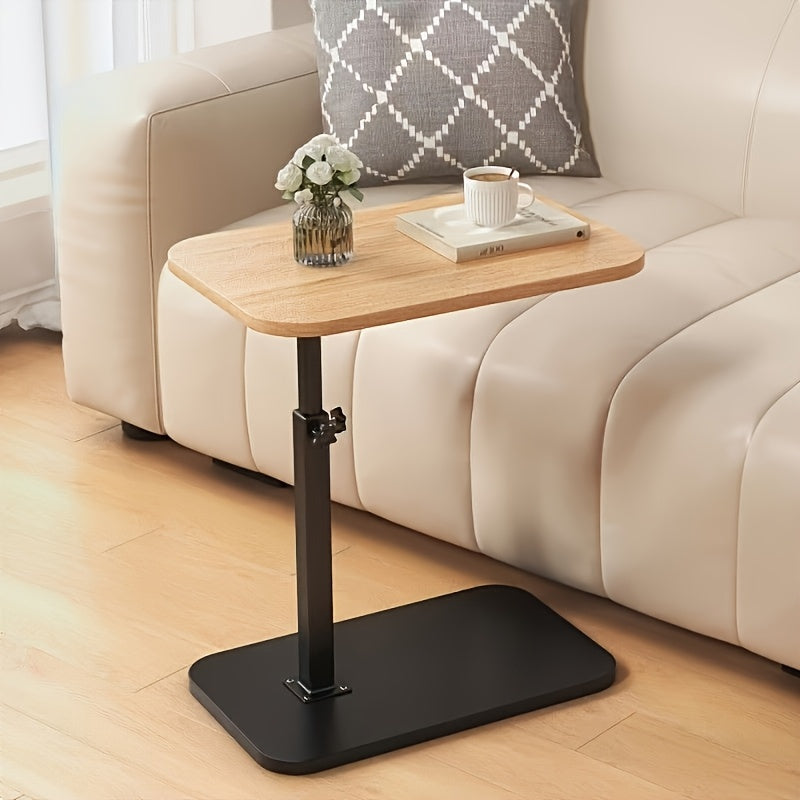 Fitlybuy adjustable side table with light wood top and black metal base next to a modern cream sofa.
