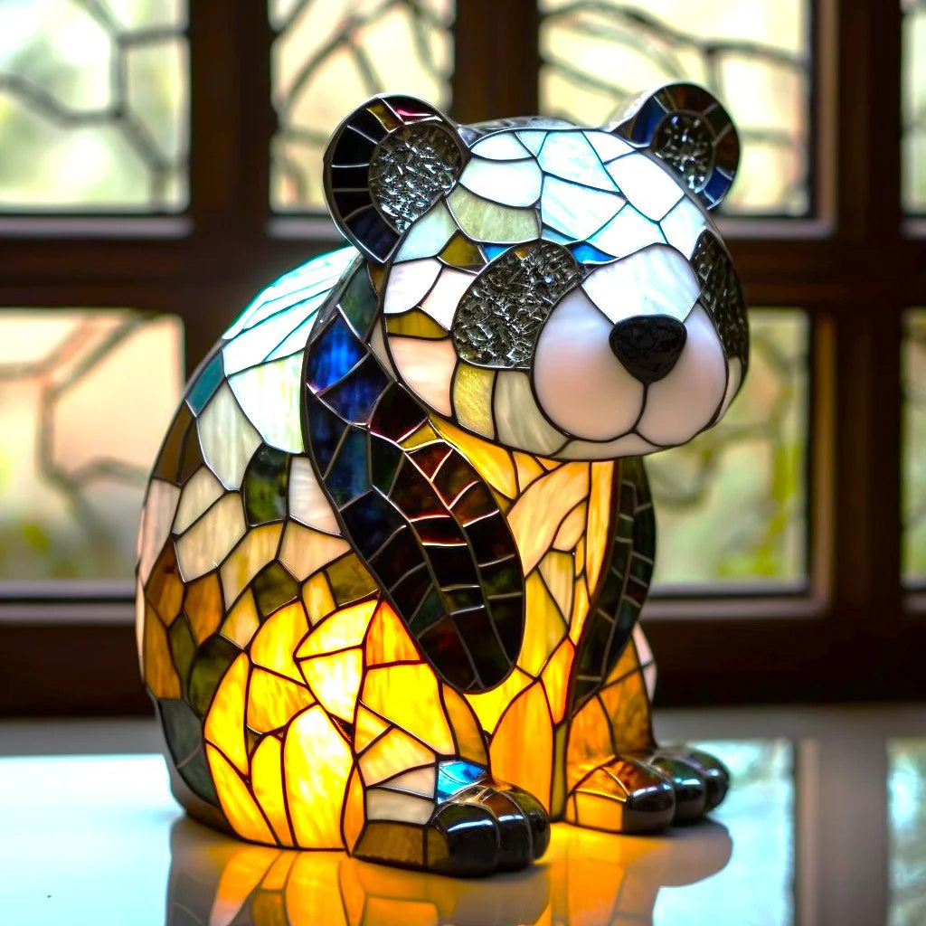 Fitlybuy stained glass panda lamp featuring colorful mosaic patterns and warm ambient light on a table by a window.