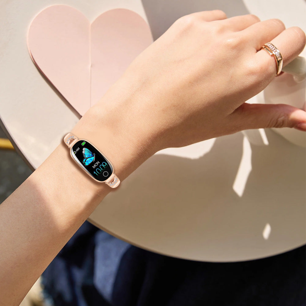 Fitlybuy Kexi-Life rose gold diamond smartwatch with butterfly screen worn on wrist, featuring health tracking tech.