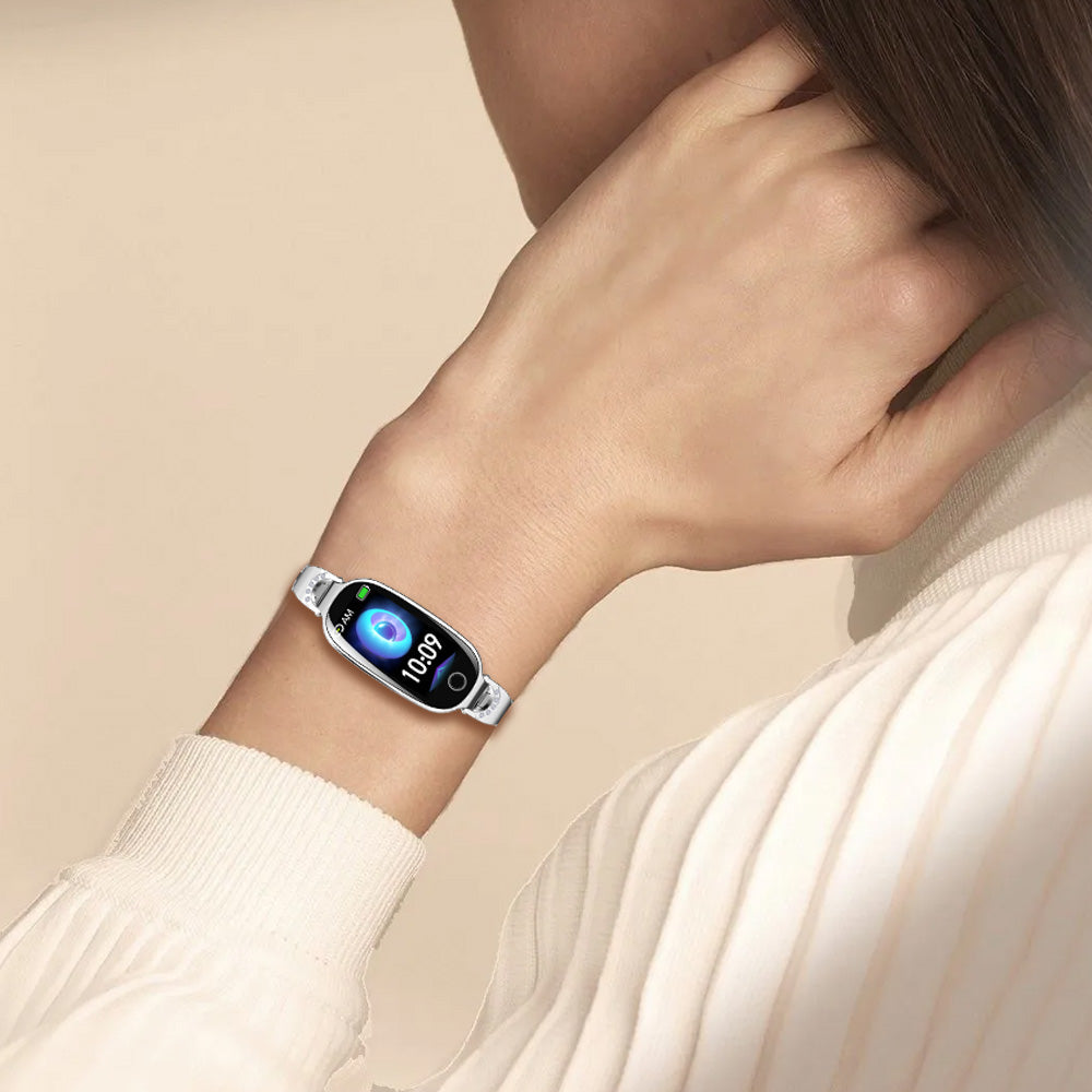 Fitlybuy Kexi-Life diamond-accented silver smartwatch tracking blood sugar and pressure on a woman’s wrist.