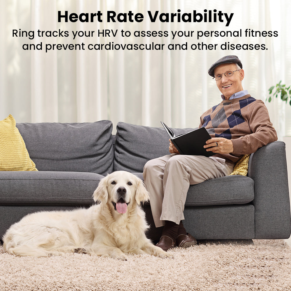 An elderly man on a sofa wears a sleek black Fitlybuy Kexi-Life R03 health ring while reading next to his dog.