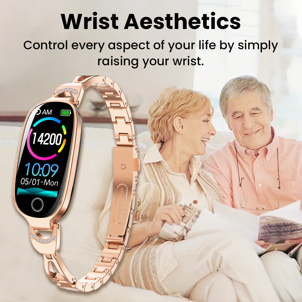 Rose gold diamond-accented Fitlybuy Kexi-Life smartwatch with digital health tracking display near a smiling couple.
