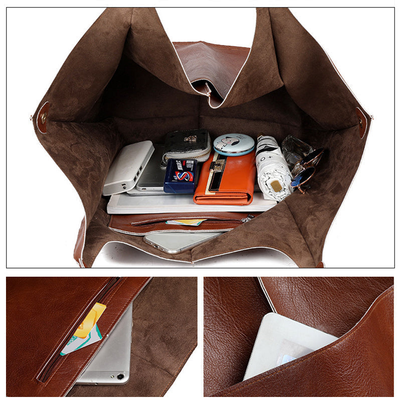 Fitlybuy oversized brown leather weekender bag with spacious interior and organizer pockets filled with travel essentials.