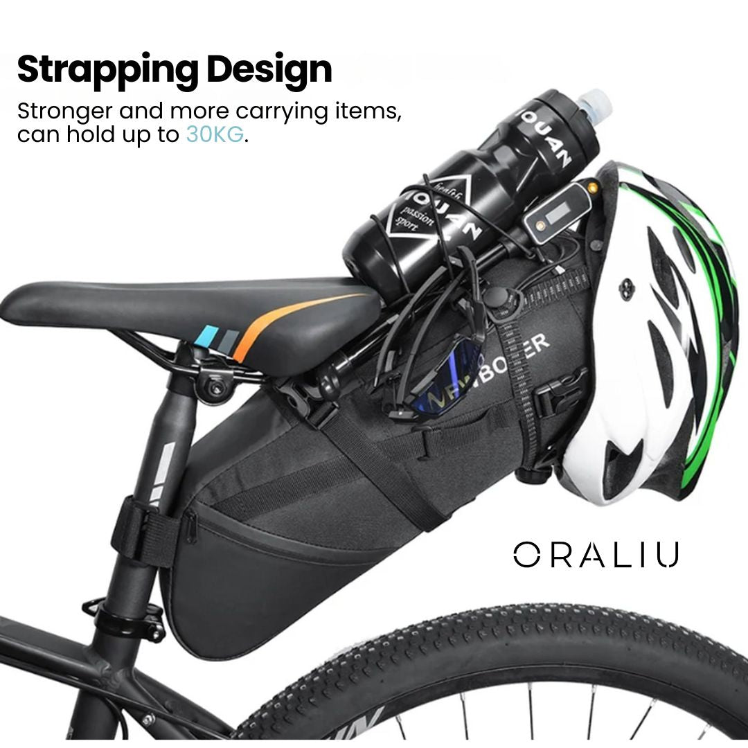 Black Fitlybuy 10L waterproof bike saddle bag strapped under a bicycle seat, holding a water bottle and helmet.