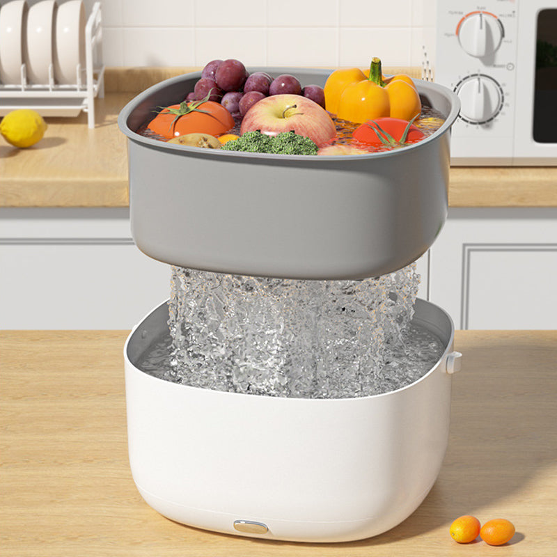 Fitlybuy FreshWave ultrasonic cleaner with two-tier design, cleaning produce in a kitchen setting.