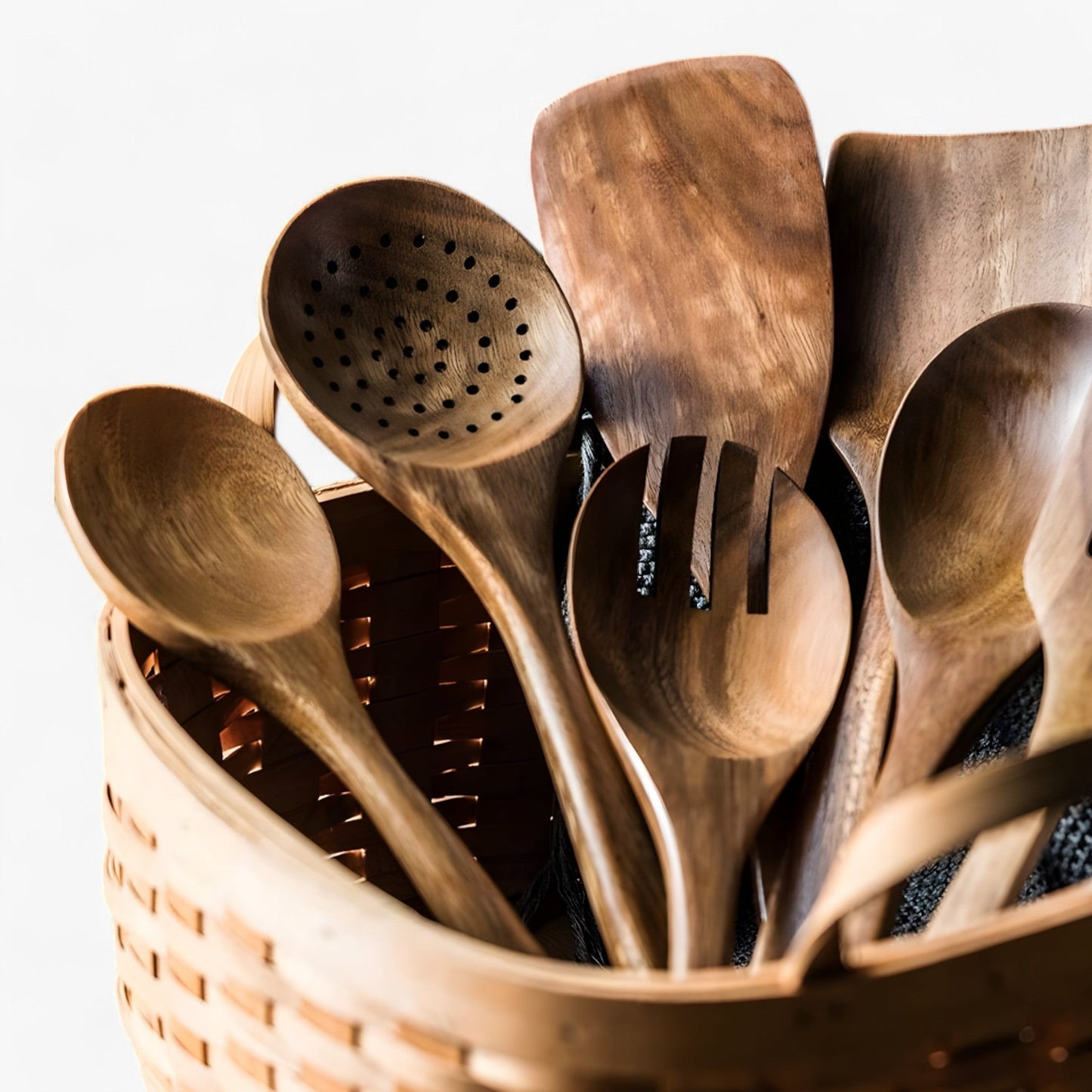 Fitlybuy 9-piece teak wood kitchen utensil set with spoons, spatulas, and strainer in a woven storage basket.