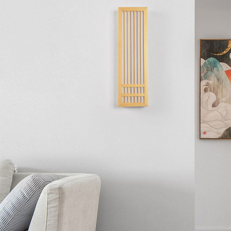Fitlybuy ShizuLight Japanese wooden LED wall lamp with ZenGlow ambient lighting mounted on a light gray living room wall.