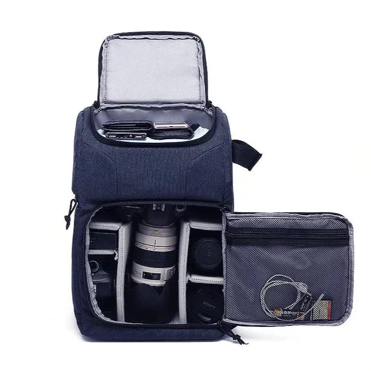 Dark grey Fitlybuy Beckett waterproof camera backpack opened to show DSLR, lenses, and accessories in padded sections.
