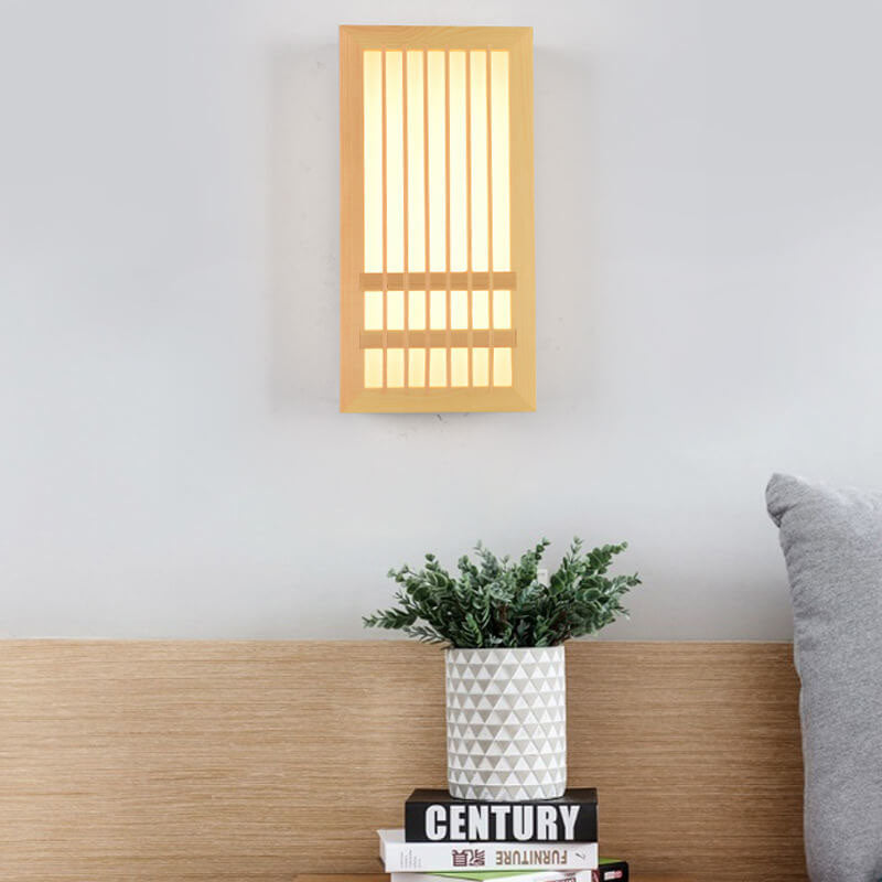 Fitlybuy ShizuLight Japanese-style wooden LED wall lamp with warm ambient ZenGlow lighting, mounted above a bedside.