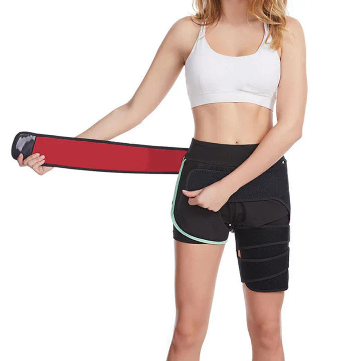Woman wearing black Fitlybuy hip and thigh compression sleeve with SupportFlex straps, isolated on white background.