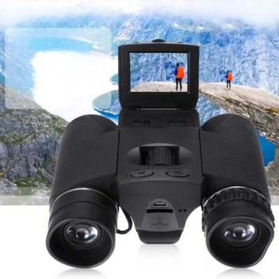 Black Fitlybuy binoculars with 10x zoom, built-in digital camera, and LCD screen, set against a mountain landscape.