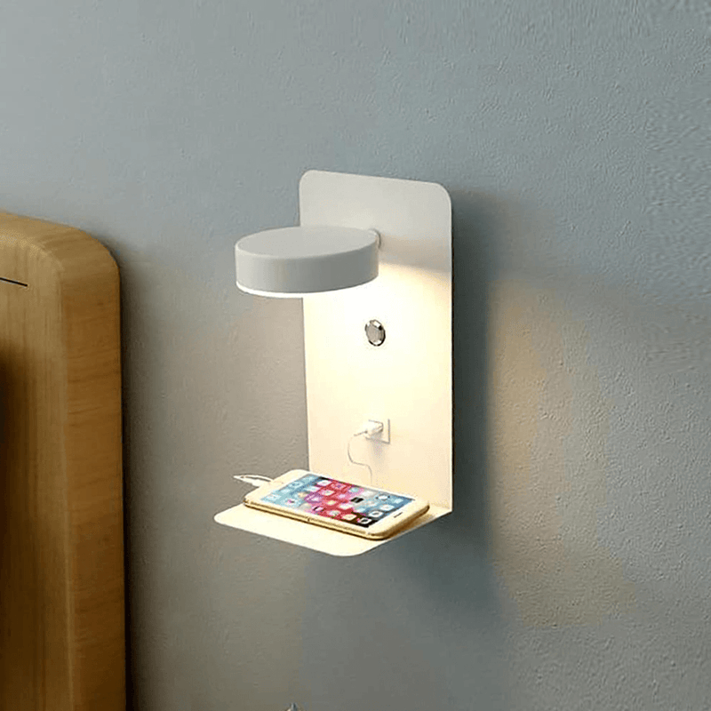 White wall-mounted Fitlybuy BrightSpot lamp with 330° rotating LED light, USB-C charging dock, and phone charging shelf.