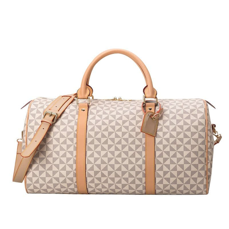Fitlybuy Westman premium travel duffle featuring a cream and grey geometric pattern with tan leather handles and strap.