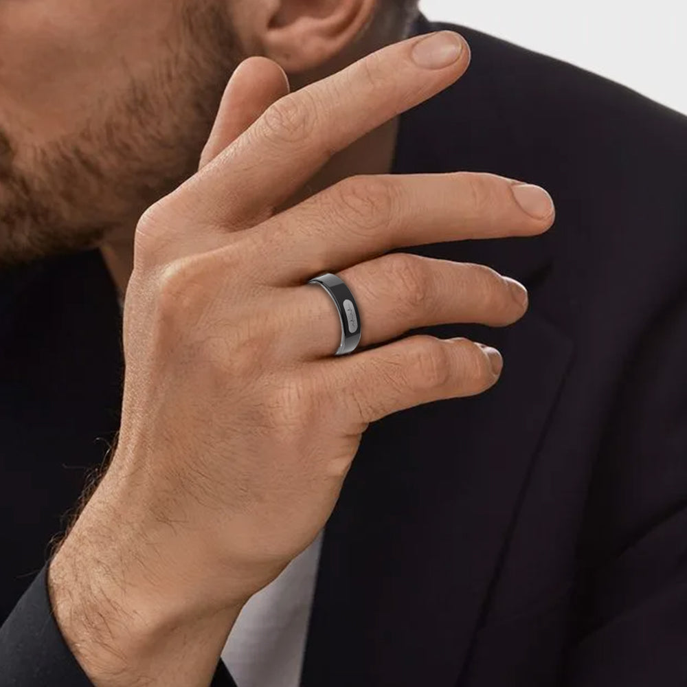 Man wearing a sleek black Kexi-Life R08 health smart ring with an EKG heart rate monitor icon on the band.