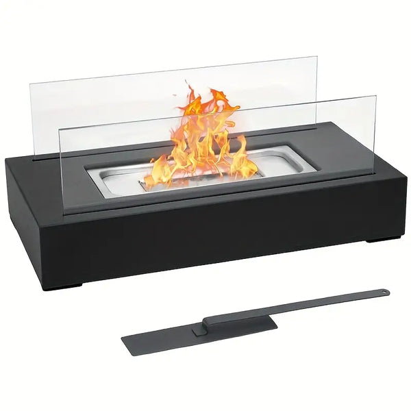 Black rectangular tabletop bio-ethanol fireplace with glass sides, smokeless flame, and a metal fire extinguisher tool.