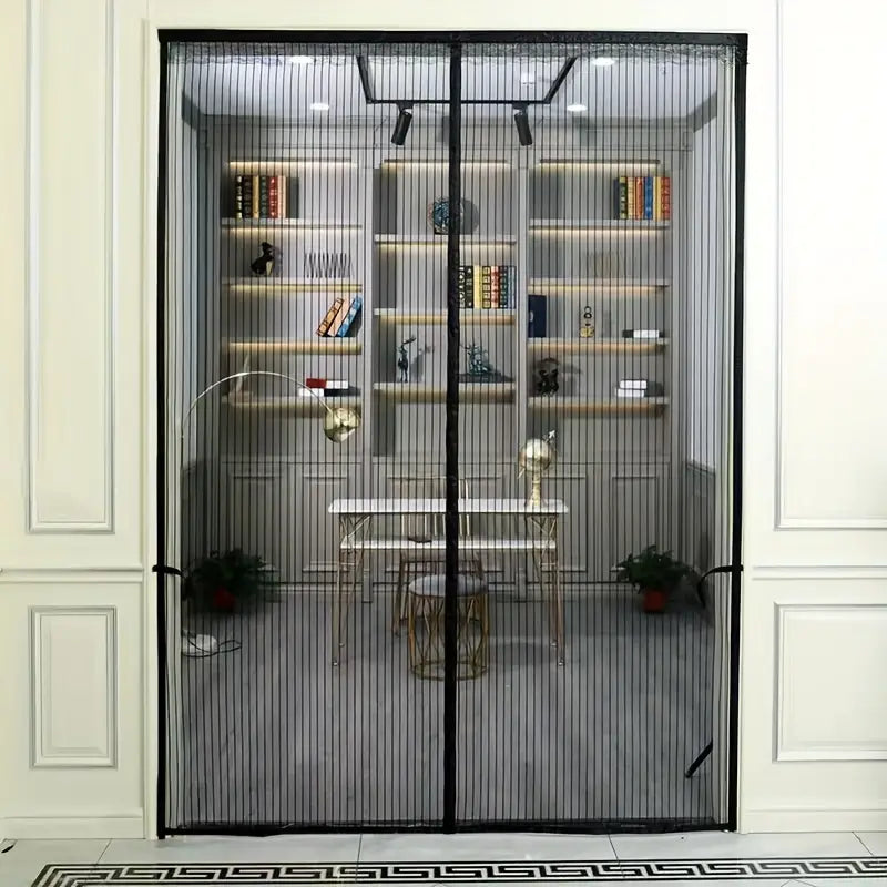 Fitlybuy black magnetic mesh fly screen door installed on a doorway, showing a home office interior in the background.