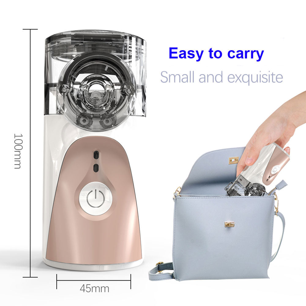 Fitlybuy portable white and rose gold mesh nebulizer with power button, shown at 100mm height being placed into a purse.