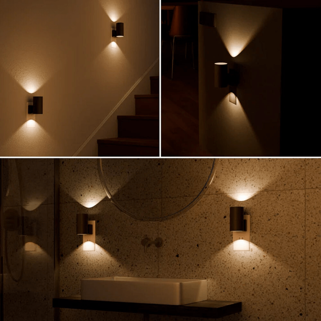 Fitlybuy Alova black LED plug-in wall light with dual-directional warm glow for hallways, stairs, and bathrooms.