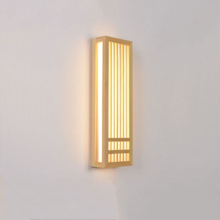Fitlybuy ShizuLight Japanese wooden LED wall lamp with glowing slatted design, mounted on a plain white wall.