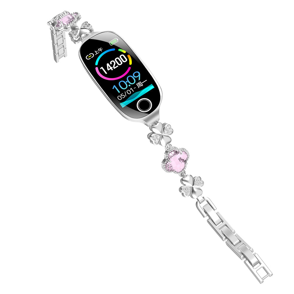 Silver luxury smartwatch with diamond-style accents, pink floral links, and a digital health tracking display.