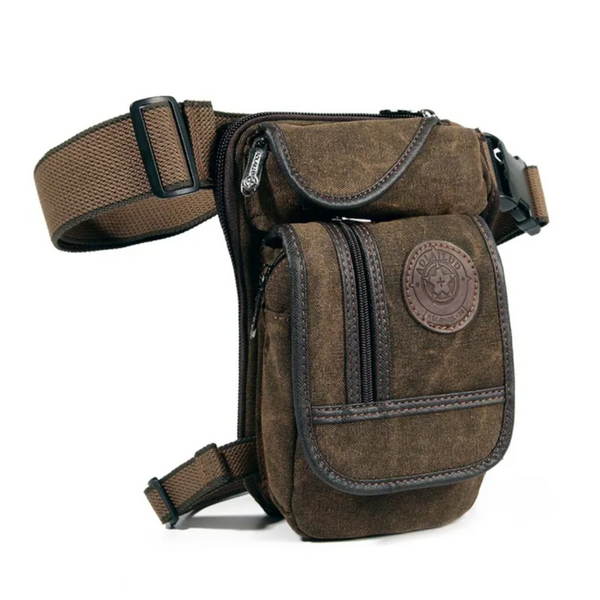 Brown waterproof canvas motorcycle leg bag with multiple zipper compartments, adjustable straps, and a branded patch.