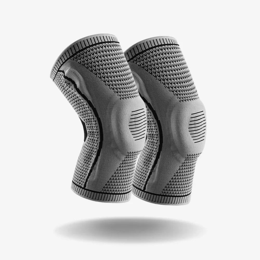 Pair of grey Fitlybuy compression knee braces with advanced stabilization pads for joint support.
