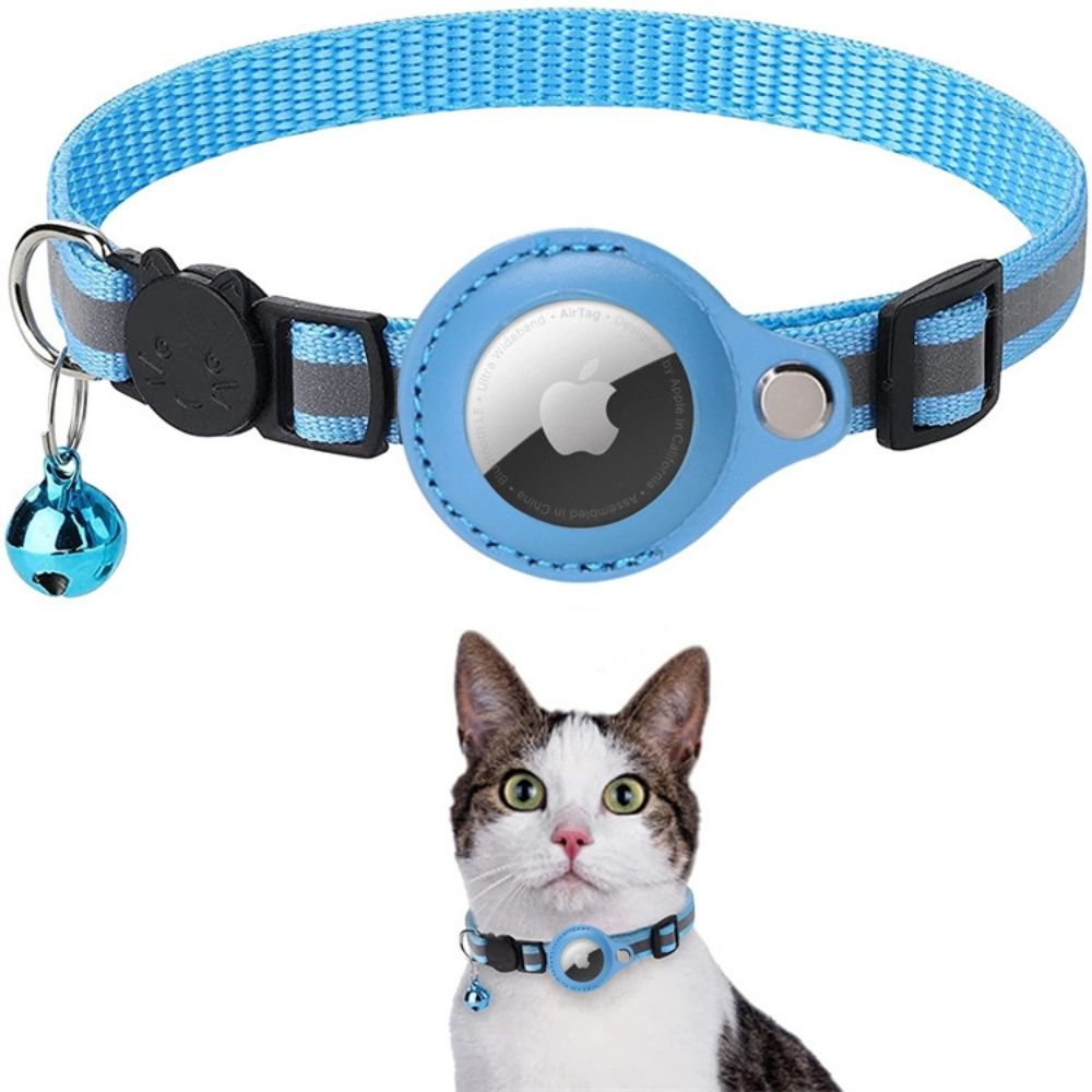 Blue reflective cat collar with AirTag holder, safety release buckle, and bell, worn by a cat.