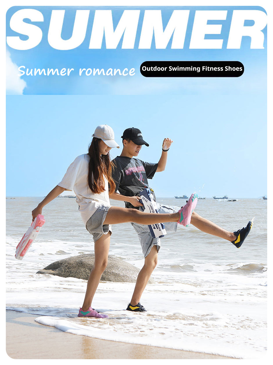 Couple wearing colorful Fitlybuy AquaStep non-slip quick-drying barefoot water shoes on a sunny beach.