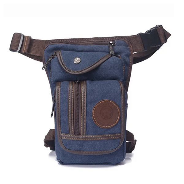 Blue canvas Fitlybuy motorcycle leg bag with brown leather trim, zippered pockets, and adjustable waist/thigh straps.