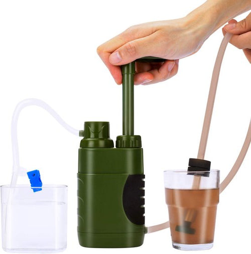 Green Fitlybuy portable water filter hand-pumping muddy water into clean water, showing its no-power survival tech.