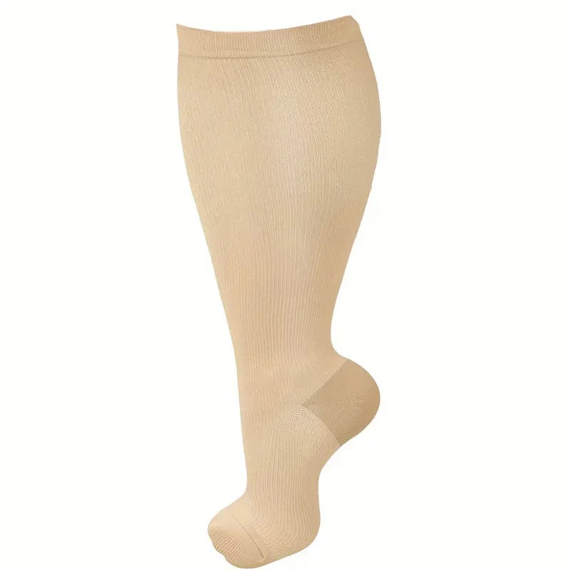 Beige Fitlybuy VitalFlow plus-size compression sock for circulation support, featuring a ribbed, knee-high design.
