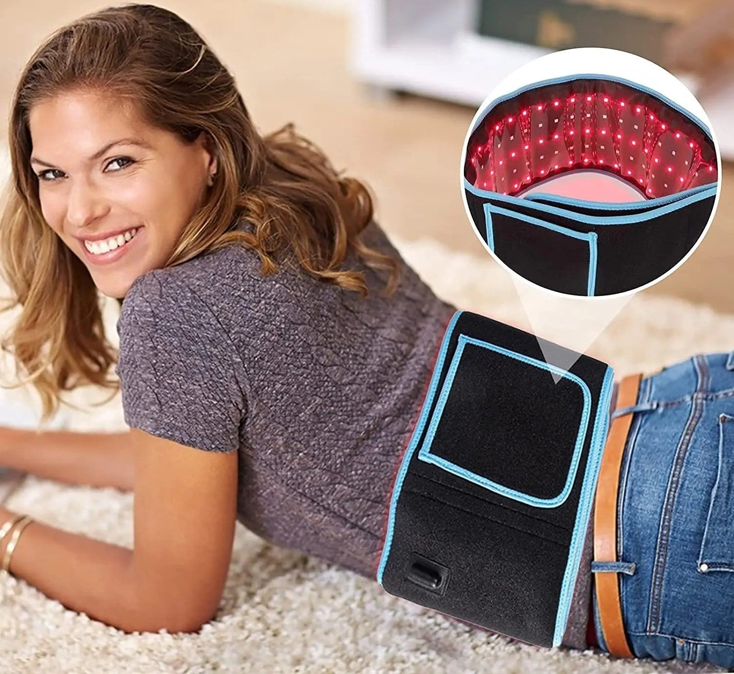 Woman wearing a Fitlybuy black and blue red light therapy slimming belt with internal infrared LED lights.