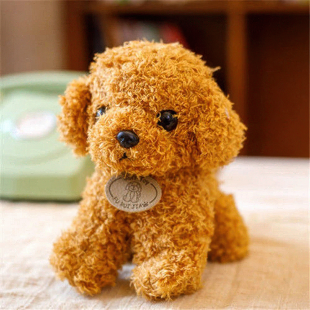 Fitlybuy golden-brown plush toy dog with curly, ultra-soft fabric and a branded tag, sitting on a tabletop.