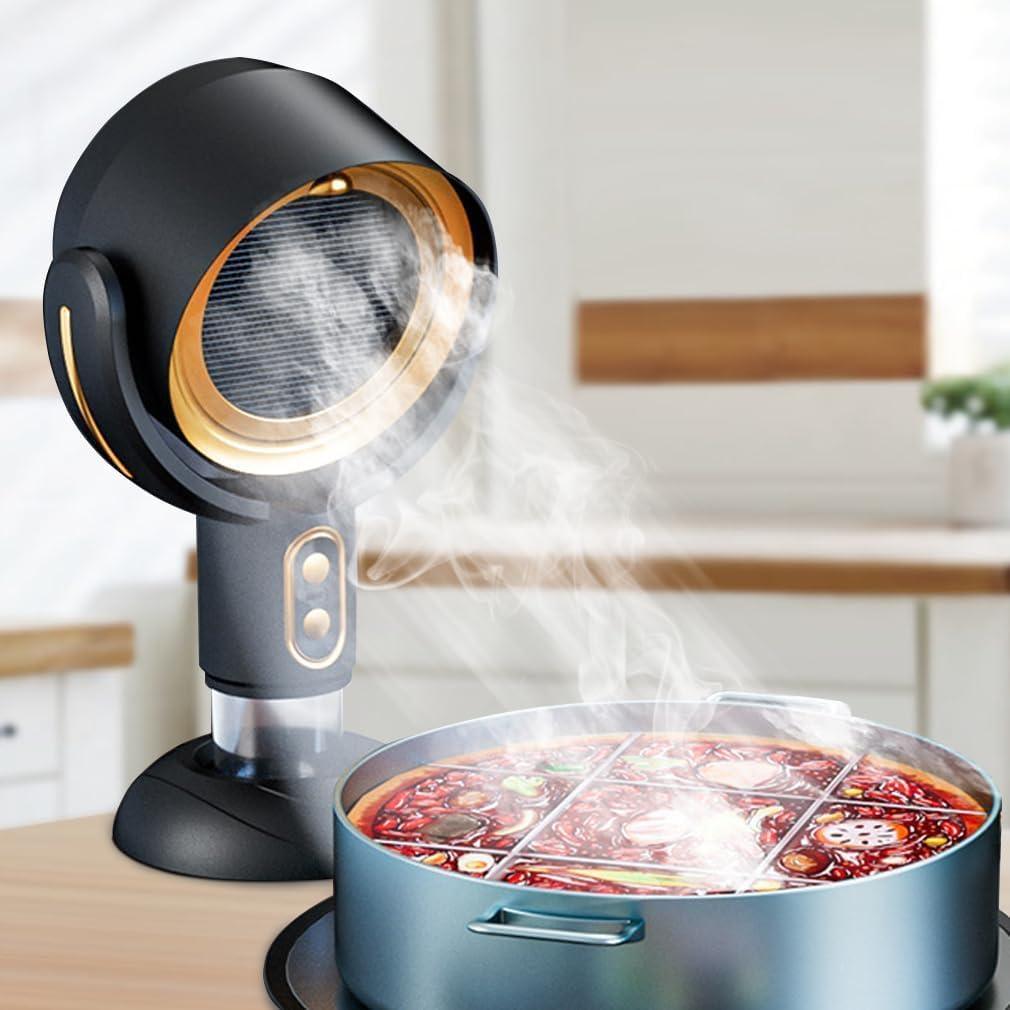 Fitlybuy portable black and gold range hood filtering steam from a hot pot on a kitchen table.