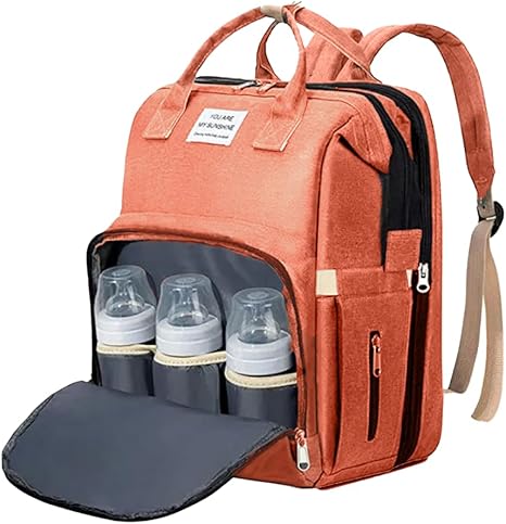 Coral pink Fitlybuy smart nappy backpack with open front pocket showing three baby bottles.