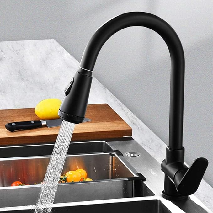 Fitlybuy Velvra matte black pull-out kitchen tap with dual spray and single lever, shown dispensing water over a sink.