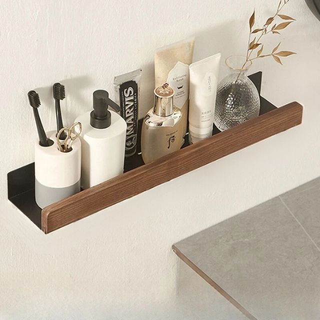 Fitlybuy wall-mounted shelf featuring a dark wood front and black metal base, holding bathroom accessories.