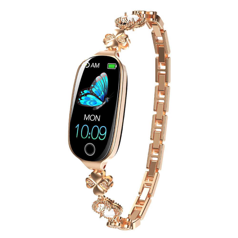 Gold Fitlybuy Kexi-Life smartwatch with diamond-style butterfly watch face, bracelet band, and fitness tracking.