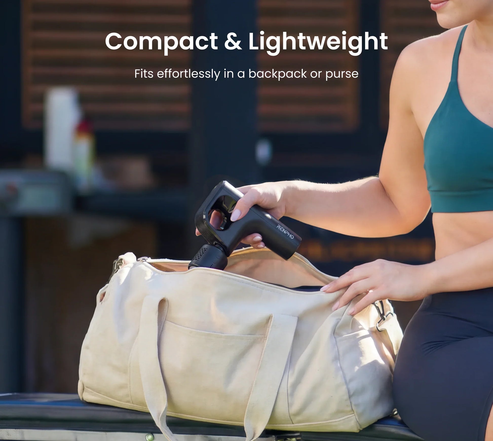 A woman in workout gear places a compact, black Fitlybuy Thermacool massage gun into a beige canvas gym bag.