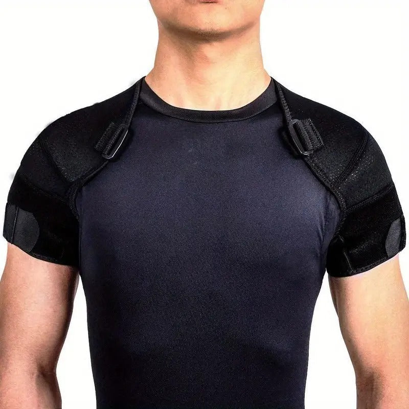 Person wearing a black Fitlybuy dual shoulder compression support wrap with adjustable straps over a black shirt.