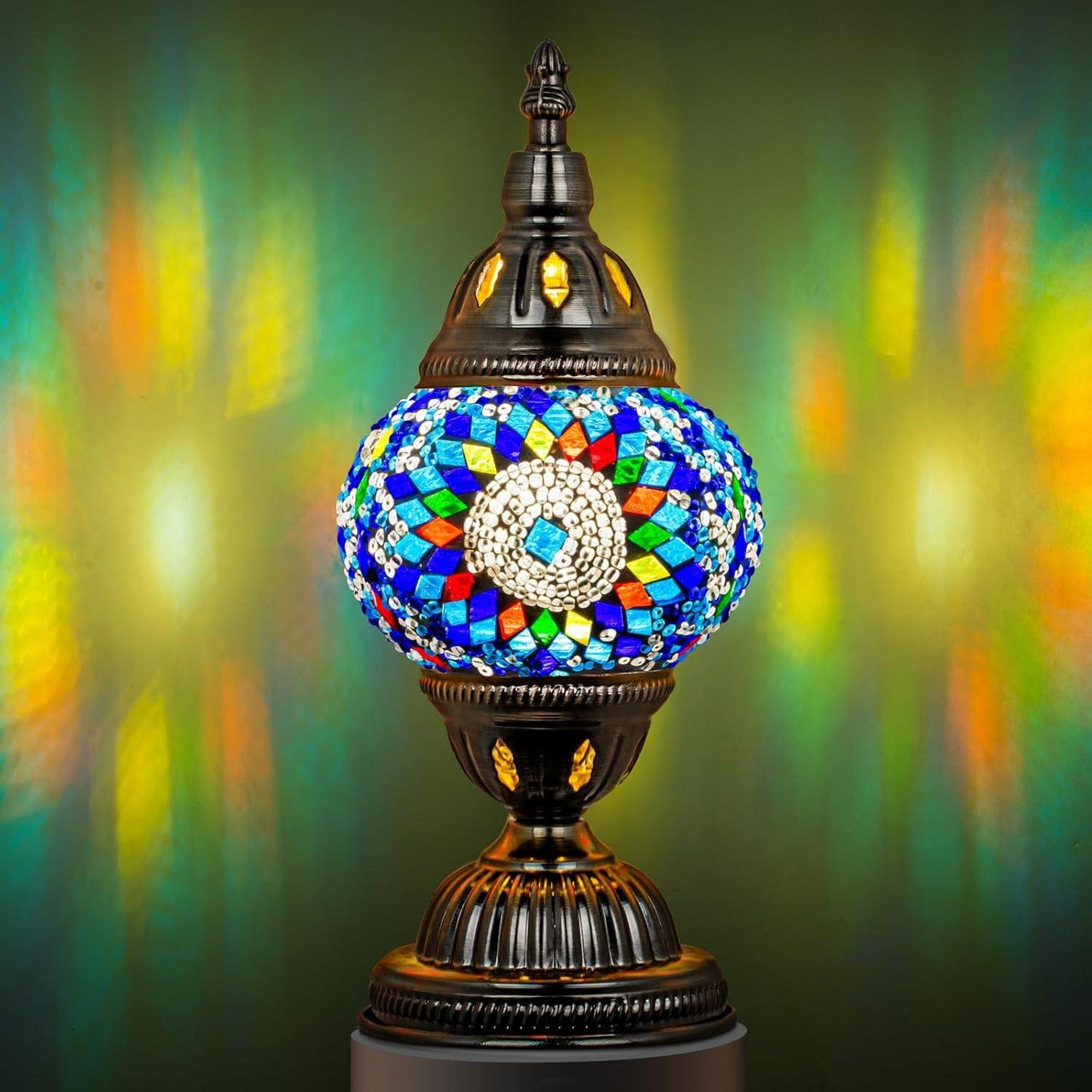Fitlybuy Marrakech Turkish lamp: colorful mosaic glass globe on an ornate bronze base glowing against a soft background.