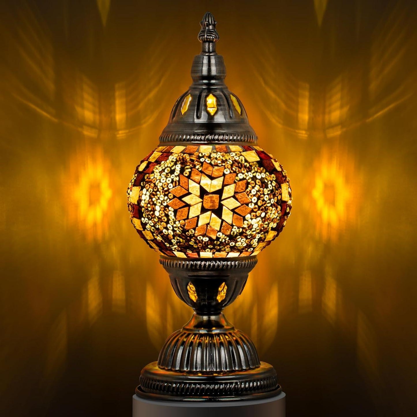Fitlybuy Marrakech Turkish table lamp: amber mosaic glass globe with a star pattern and ornate bronze metal base.