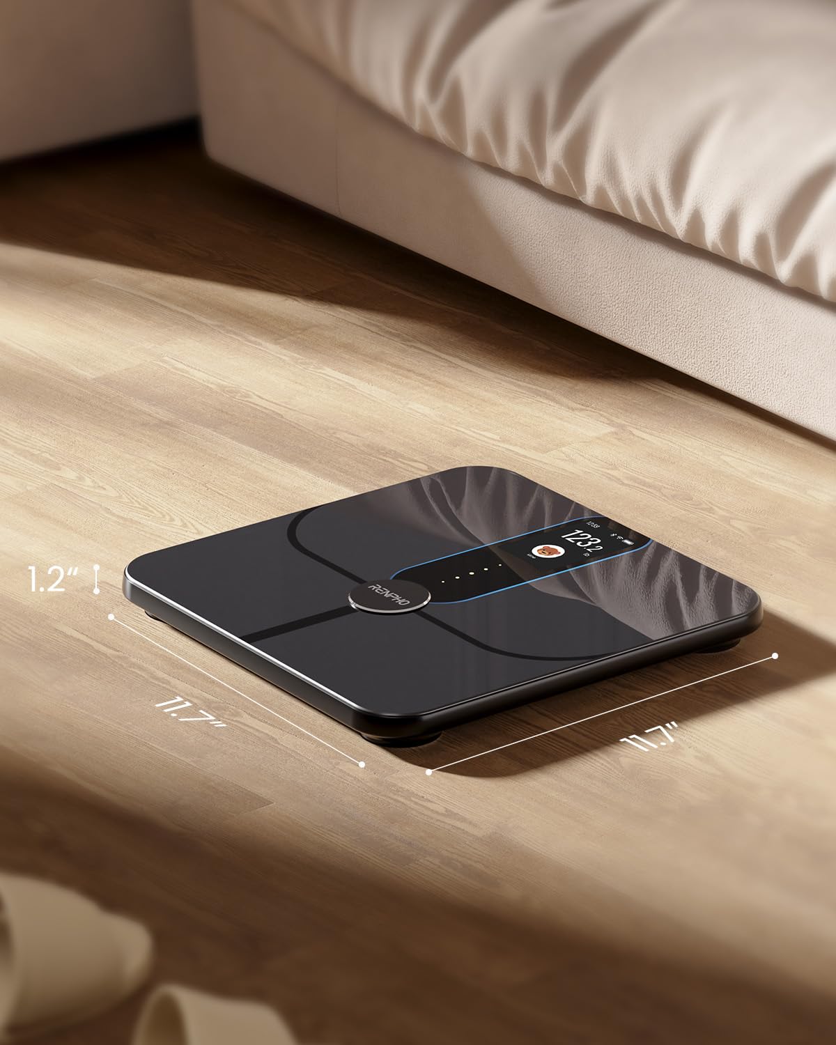 Fitlybuy Elis Nova black smart body scale on a wood floor, featuring a digital display with dimension labels.