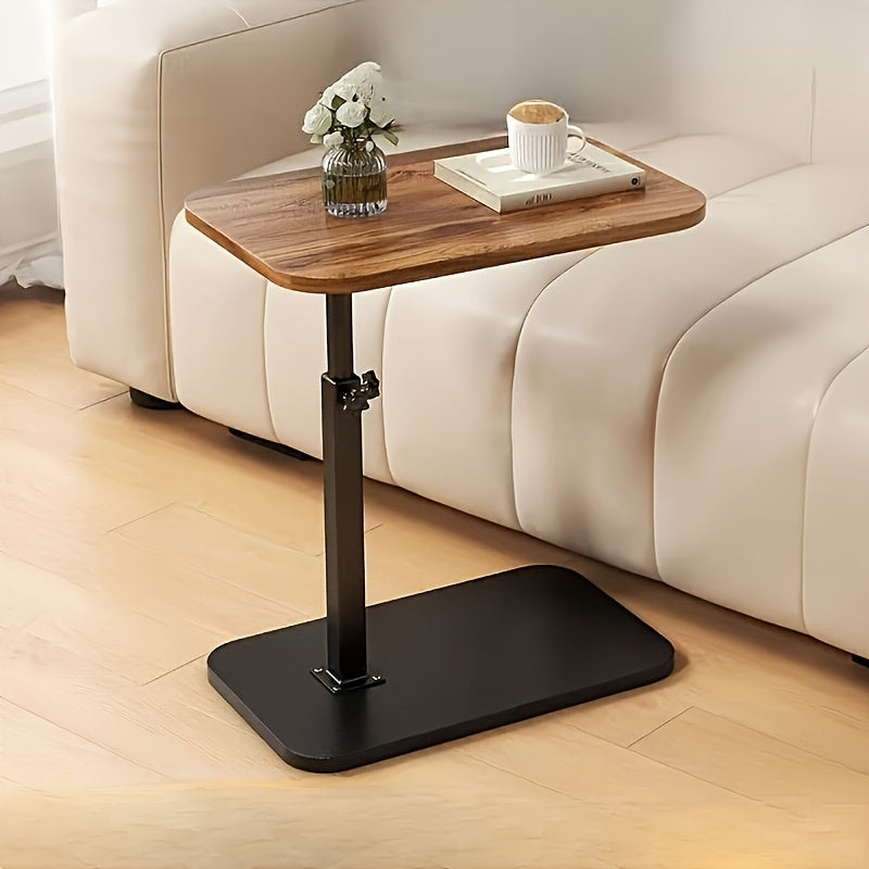 Fitlybuy adjustable side table with walnut top and black base beside a white sofa, holding a coffee cup and vase.