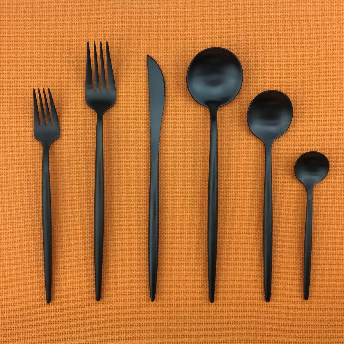 Fitlybuy Torin 36-piece minimalist cutlery set: matte black stainless steel utensils on an orange textured background.